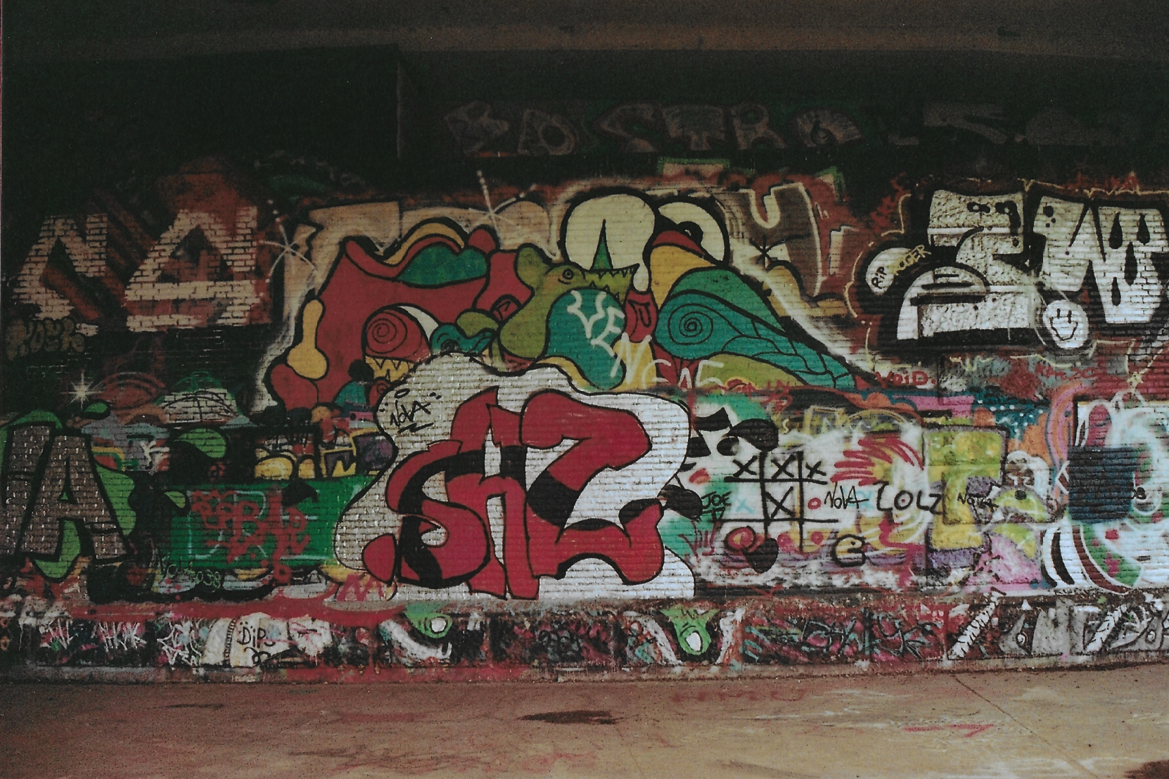 analog picture of graffiti walls